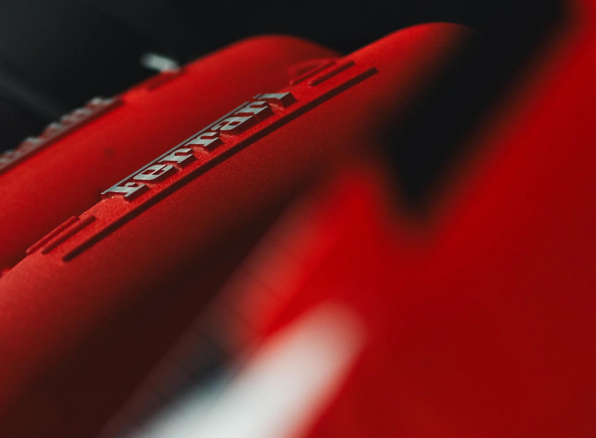 Ferrari engine detail in red — Silverstone Drive Experience relaunch campaign